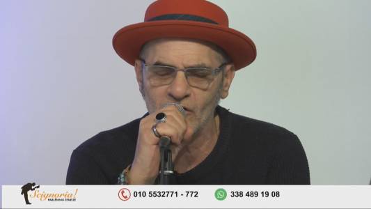 De André, 25 anni dopo: la sorpresa a Telenord, Baccini canta "Il Pescatore" con gli Zena Singers nella puntata di 'Scignoria!'