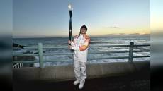 La fiamma olimpica a Genova, simbolo di unità, pace e investimento per il futuro dell'Italia