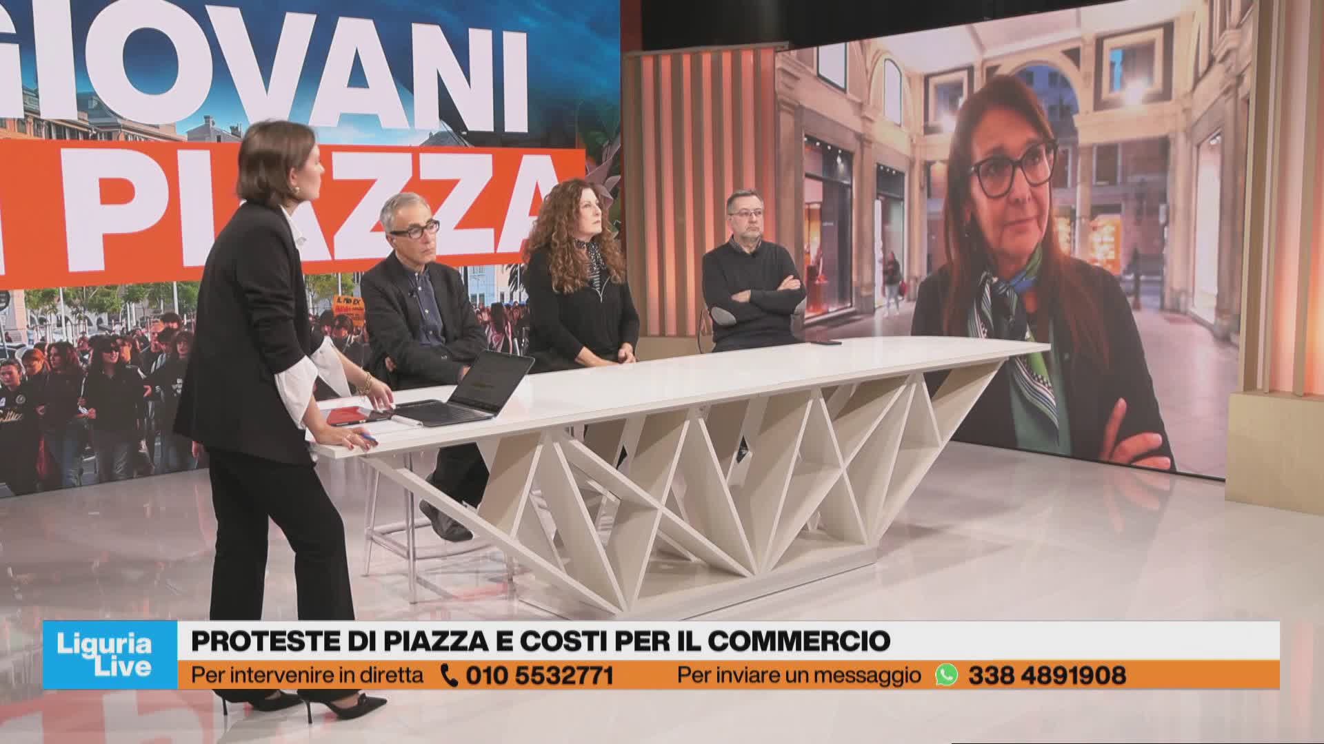 Giovani pacifici in piazza, ma negozi barricati pronti agli scontri: l'impatto economico
